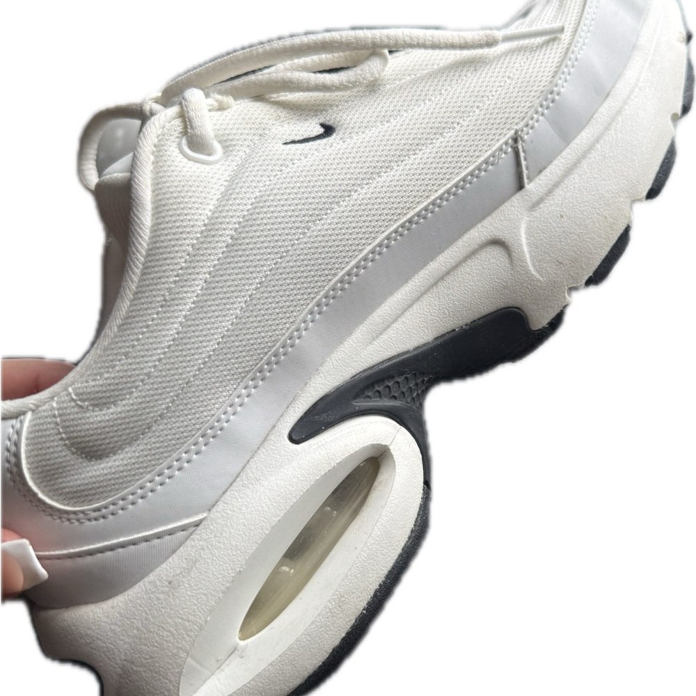 Nike Pro Max
White and Black Athletic Shoes